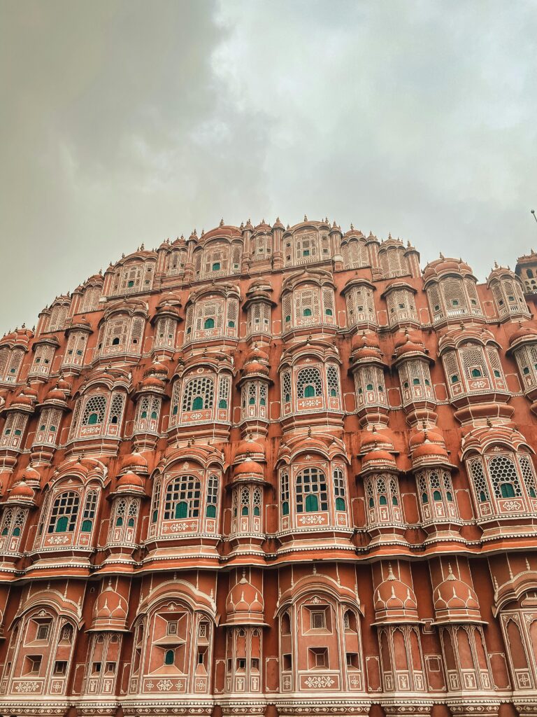 Magnificent facade of Hawa Mahal showcasing intricate Rajasthani architecture in Jaipur.